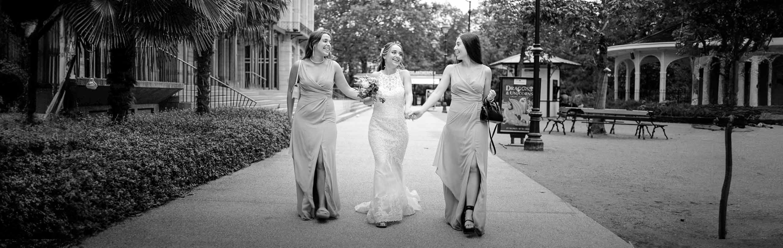 Wedding day. 3 sisters walking